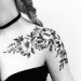 flower-shoulder-tattoo-585x585